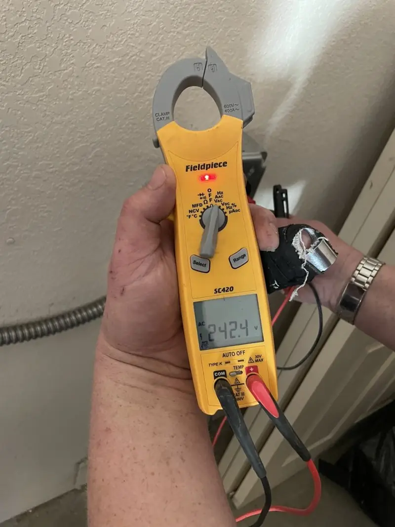 Voltage testing with clamp meter during Generator Installation in San Ramon